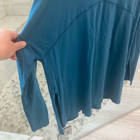 Lululemon discontinued top. Teal blue. Size 10 oversized shirt with side slit. - Picture 1 of 3